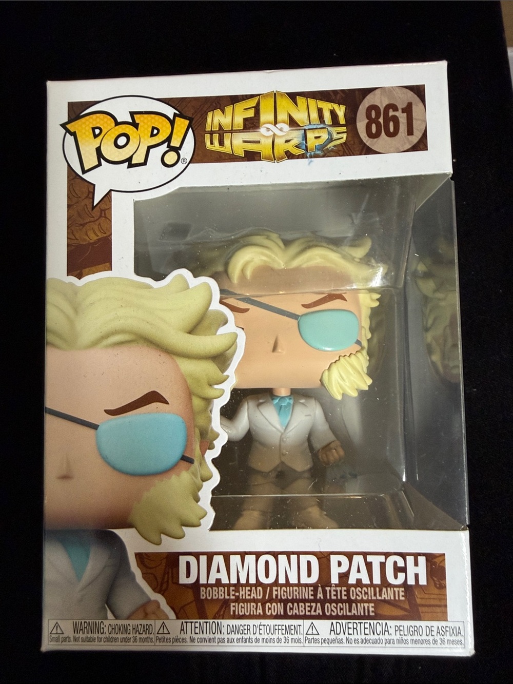 Funko Diamond Patch Pop! Blonde Hair with Teal Eyepatch and Teal Tie